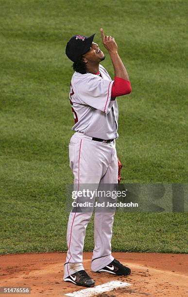 Pitcher Pedro Martinez of the Boston Red Sox points to the sky before pitching against the New York Yankees in the first inning during game two of...