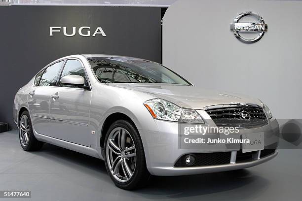 Newly introduced all-new Fuga, a luxury sports sedan of Nissan Motor Co., Ltd., is seen during a press conference on October 14, 2004 in Tokyo,...