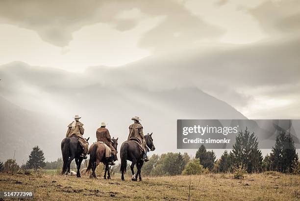 men and woman enjoying horse riding - man on horse back stock pictures, royalty-free photos & images