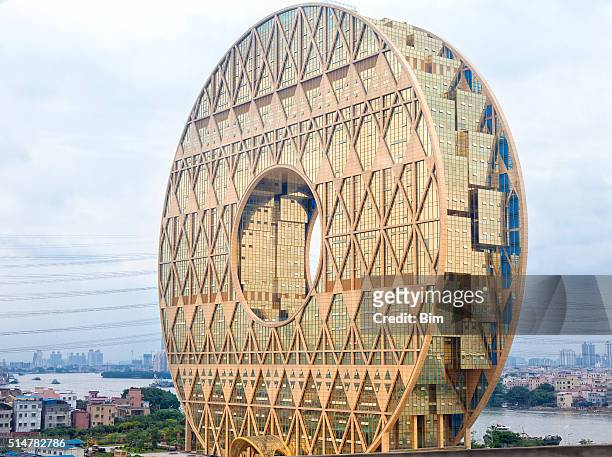 modern office building in guangzhou, china - circular business district stock pictures, royalty-free photos & images