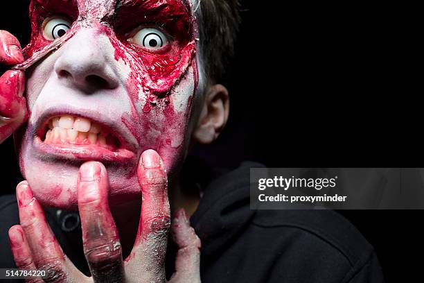 halloween man face - zombie makeup stock pictures, royalty-free photos & images