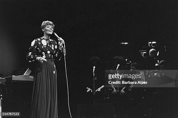 American singer, Dionne Warwick, performs on stage at Radio City Music Hall, New York City, USA, 12th June 1980.