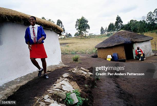 Nobule Ngema smiles as she's excited about traveling to the annual Reed Dance on September 10, 2004 in Ngudwini village in rural Natal, South Africa....