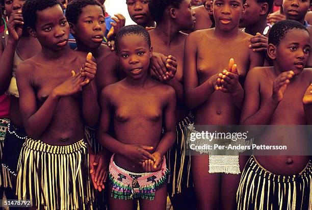 Girls wait to tested for their virginity during the annual Reed Dance on September 11, 2004 in Nongoma in rural Natal, South Africa. About 20,000...