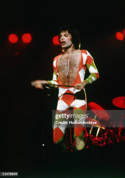 Freddie Mercury in concert with his hard rock group Queen, June 1977.