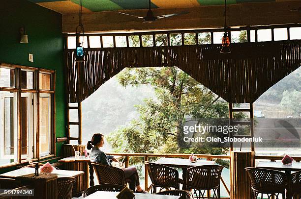 woman in cafe - rishikesh stock pictures, royalty-free photos & images