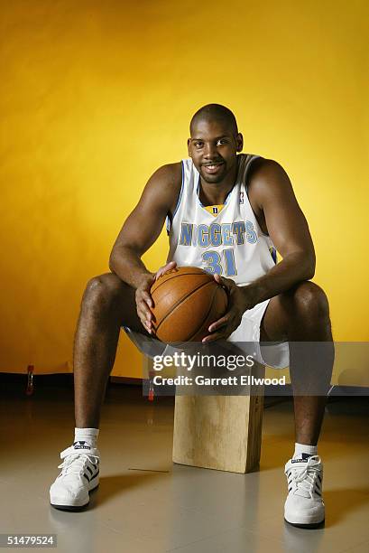 Nene of the Denver Nuggets poses for a portrait during NBA Media Day on October 4, 2004 in Denver, Colorado. NOTE TO USER: User expressly...