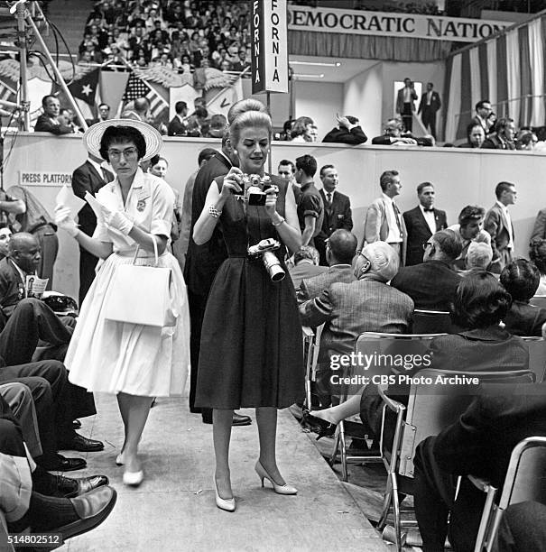News reports from the 1960 Democratic National Convention, Los Angeles, California CBS News correspondent, Betty Furness, takes some still photos on...