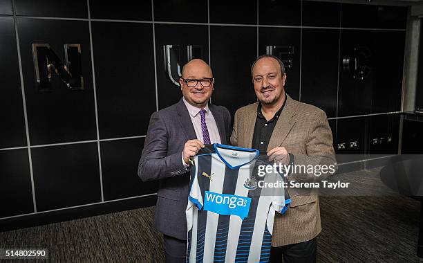 Rafael Benitez poses for photographs with Managing Director Lee Charnley after signing as Newcastle United's new manager at St.James' Park on March...