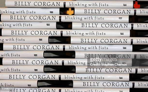 Copies of Billy Corgan's new book, "Blinking With Fists" is stacked up before his appearance at Virgin Records to sign it October 14, 2004 in New...