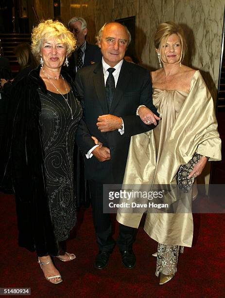 Jude Law's parents, Maggie and Peter Law, and Sienna Miller's mother Josephine arrive at the World Premiere of "Alfie" at the Empire Leicester Square...