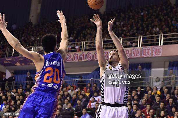 Shavlik Randolph of Liaoning Flying Leopards shoots the ball during the Chinese Basketball Association 15/16 season play-off final match between...