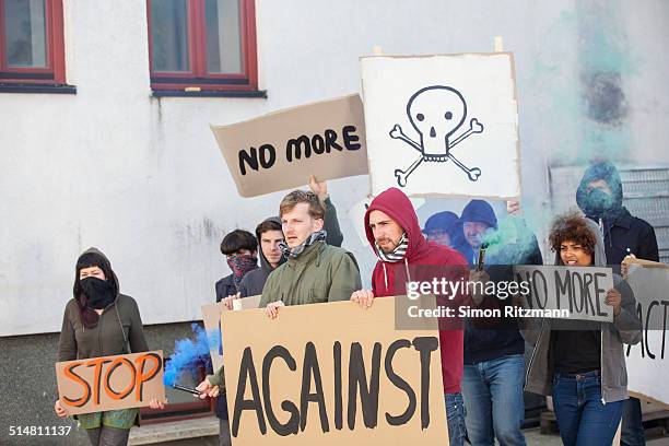 group of activists demonstrating with banners - march 22 2013 stock pictures, royalty-free photos & images