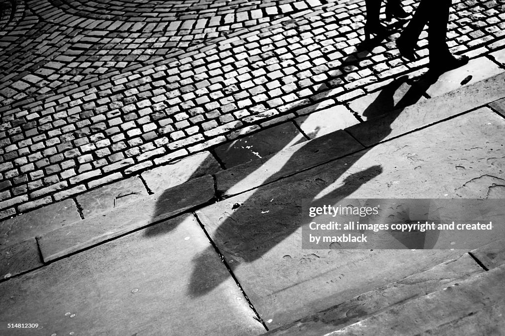 Shadows on the cobbles