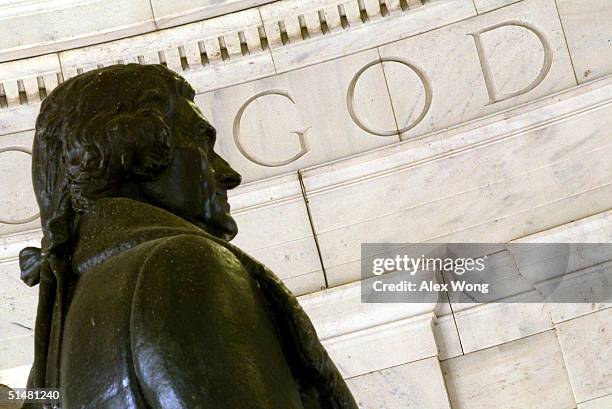 The word "God" is seen on the wall of the Thomas Jefferson Memorial October 14, 2004 in Washington, DC. Although the U.S. Constitution prohibits an...