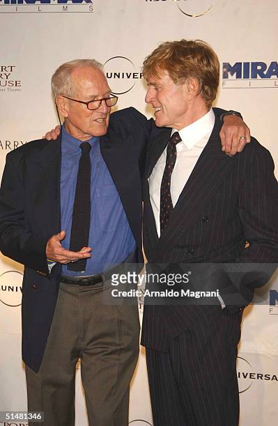 Actors Paul Newman and Robert Redford attend the Westport Country Playhouse "Building the Future: A Gala Evening" auction October 14, 2004 in...