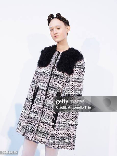 Model prepares backstage before the Moncler Gamma Rouge show as part of the Paris Fashion Week Womenswear Fall/Winter 2016/2017 on March 9, 2016 in...