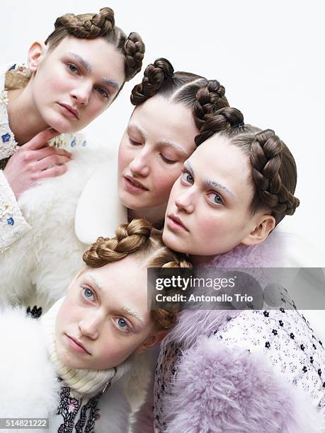 Models prepares backstage before the Moncler Gamma Rouge show as part of the Paris Fashion Week Womenswear Fall/Winter 2016/2017 on March 9, 2016 in...