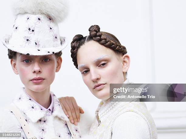 Models prepares backstage before the Moncler Gamma Rouge show as part of the Paris Fashion Week Womenswear Fall/Winter 2016/2017 on March 9, 2016 in...