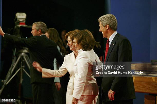 Democratic presidential candidate U.S. Senator John Kerry and wife Theresa Heinz Kerry along with first lady Laura Bush face the crowd after the...