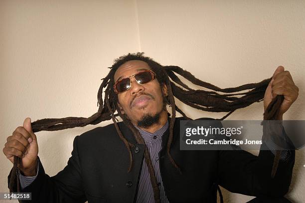 Poet Benjamin Zephaniah poses at a photo call at The Bookshop on December 10, 2003 in London, England.