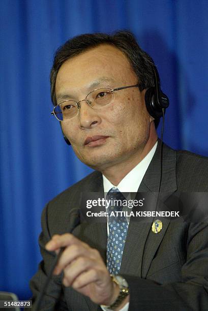 South Korean Prime Minister Lee Hai Chan listens to a journalist's question in the main hall of the government resort in Balatonoszod, some 130 kms...