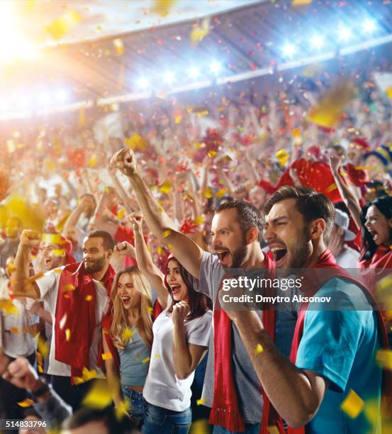 sport fans: happy cheering friends - soccer supporter stock pictures, royalty-free photos & images