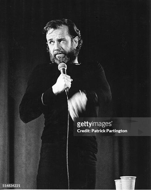 American comedian and actor George Carlin performs onstage at Indiana University, Indiana, 1977.