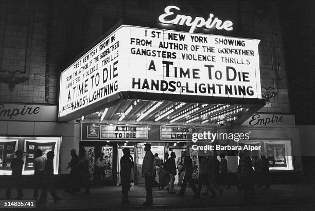 The entrance to an Empire cinema advertising 'A Time To Die', 8th Avenue, New York City, USA, 1983.