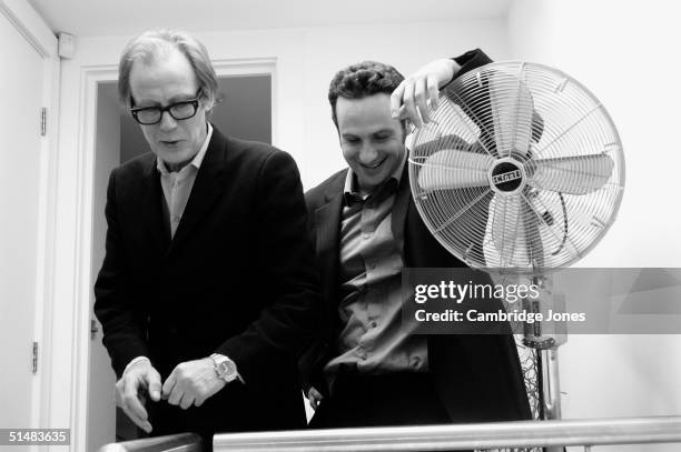 Actors Bill Nighy and Andrew Lincoln pose during a photo call held on March 6, 2004 in Chelsea, London.