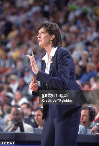 ? Head Coach Anne Donovan of the Seattle Storm sends signals against the Connecticut Sun in Game three of the WNBA Finals on October 12, 2004 at Key...