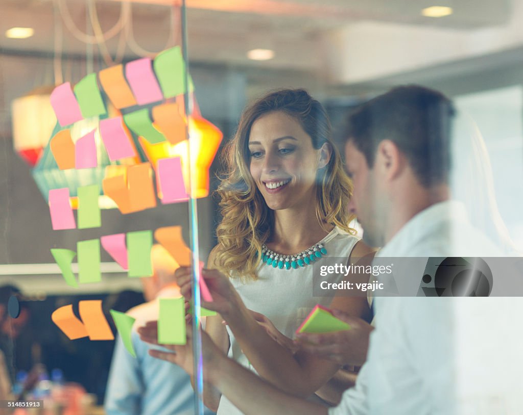 Sticky Notes Person Business People Looking At Sticky Notes And Writing High-Res Stock ...