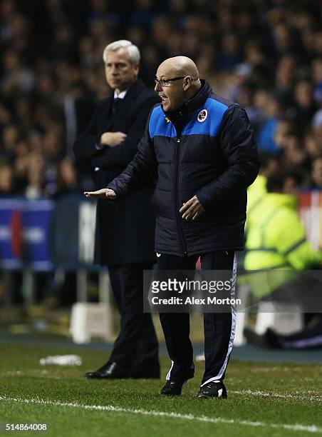 Brian McDermott manager of Reading gives instructions as Alan Pardew manager of Crystal Palace looks on during the Emirates FA Cup sixth round match...