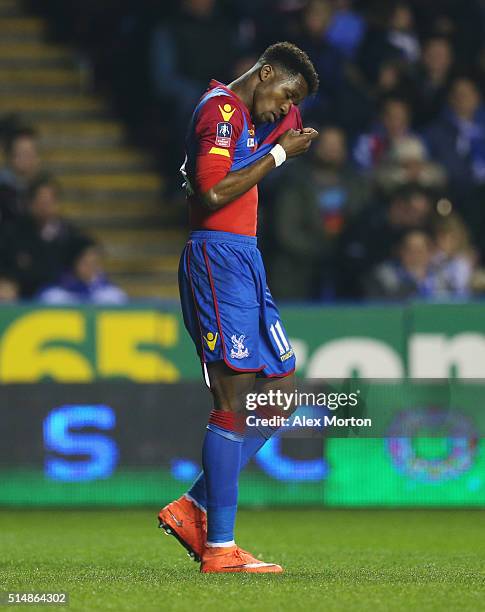 Wilfried Zaha of Crystal Palace reacts during the Emirates FA Cup sixth round match between Reading and Crystal Palace at Madejski Stadium on March...