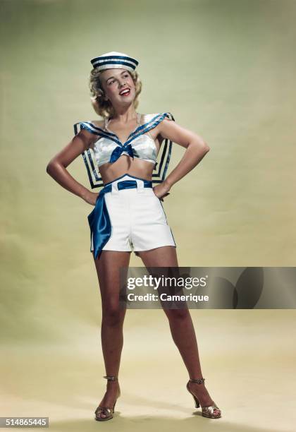 Pinup girl in sailor suit, Los Angeles, California, 1949.