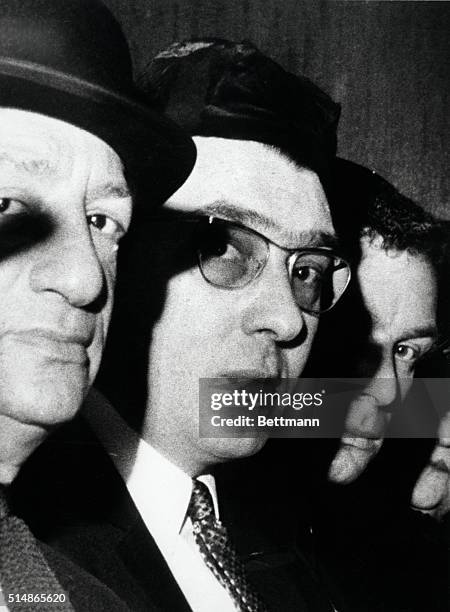 Close-up of the murderer twins, Ronald, wearing glasses, and Reginald Kray at the memorial service for Sophie Tucker.