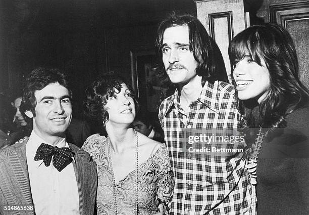 James Taylor and Carly Simon with newlyweds David Steinberg and Judy Marcionne at their wedding reception in New York.