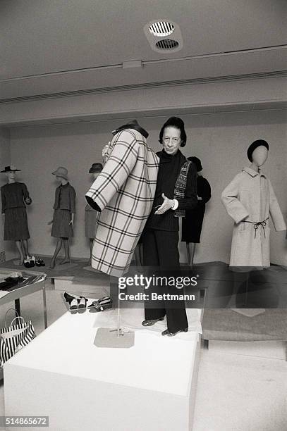 New York City: Metropolitan Museum. Diana Vreeland shows off a one seam coat by Balenciaga. Photograph, 3/22/73.