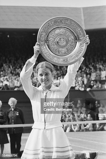 Wimbledon: Chris Evert of the USA holds trophy aloft after winning the Wimbledon Ladies' singles title here 7/5. She beat Olga Mororzova 6-0,6-4....