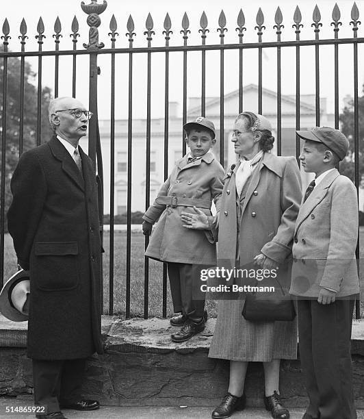 Washington: With their grandmother, the two young sons of convicted atom spies Julius and Ethel Rosenberg watch as Rabbi Abraham Kronback of...