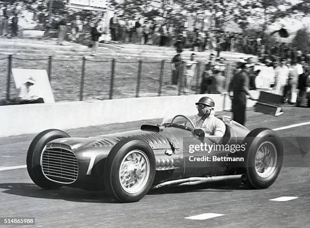 Albi, S. France: Juan Manuel Fangio warms up in his "BRM" before the Grand Prix D'Albi race being held May 31 in Albi, southern France. Fangio, a big...