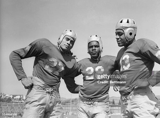 Portrait of UCLA football players Woodrow Strode, Jack Robinson and Kenny Washington.