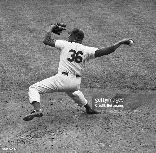 Don Newcombe, Dodgers pitcher, on the mound in action.