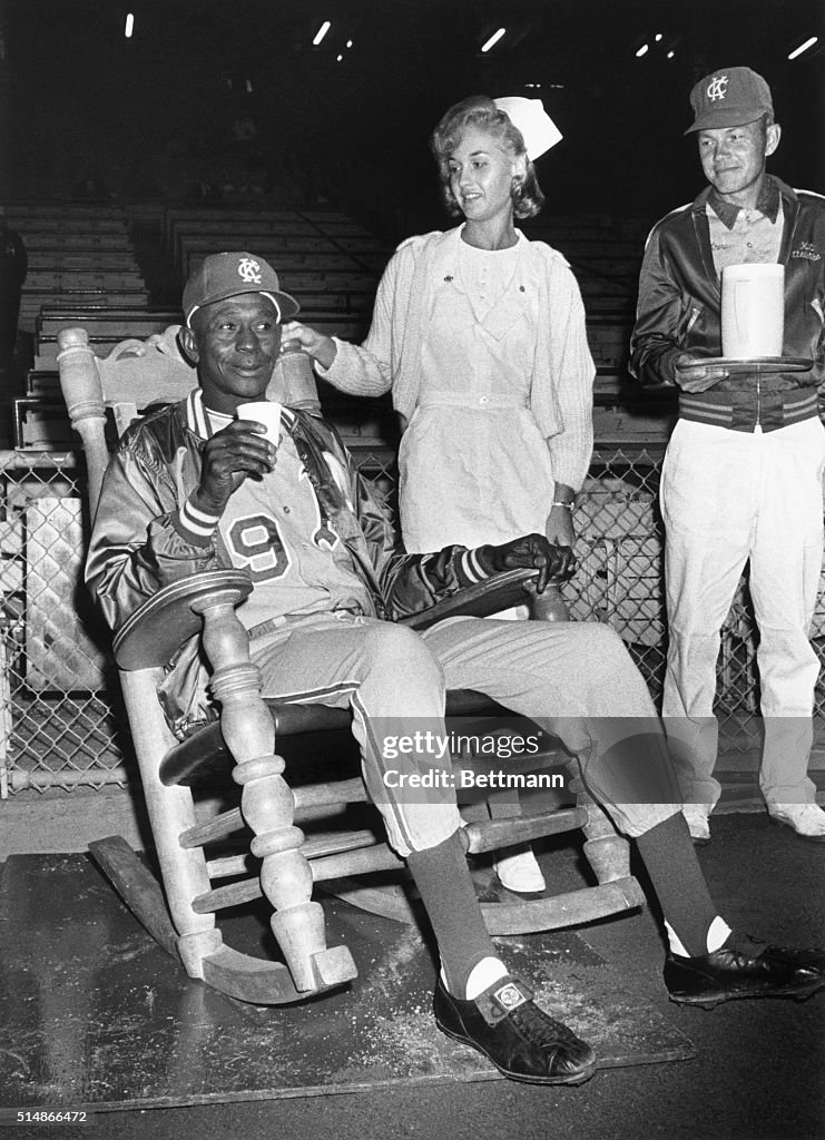 Satchel Paige in a Rocking Chair at a Game