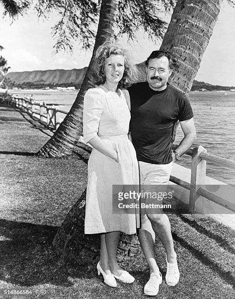 Waikiki, HI: Mr. And Mrs. Hemingway on beach at Waikiki.