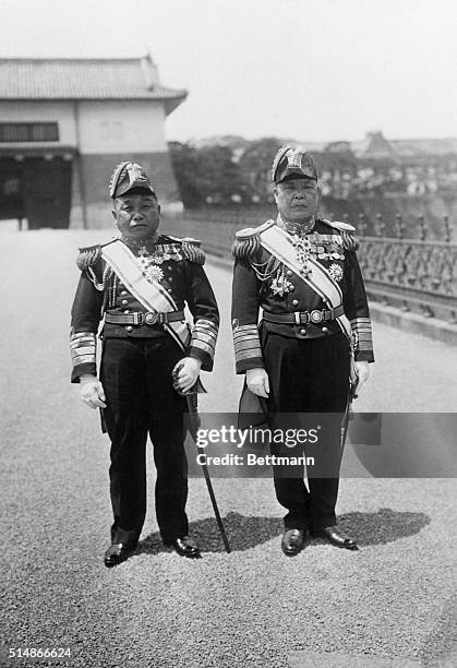 Admirals Yeisuke Yamamoto and M. Osumi of the Imperial Japanese Navy.