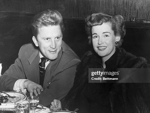 New York, NY: Kirk Douglas, star of such screen hits as "Champion" and "Young Man with a Horn" was photographed dining with his estranged wife, Diana...