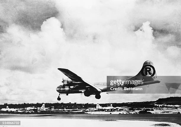 The Enola Gay lands back on Tinian after dropping the first military atomic bomb on Hiroshima.