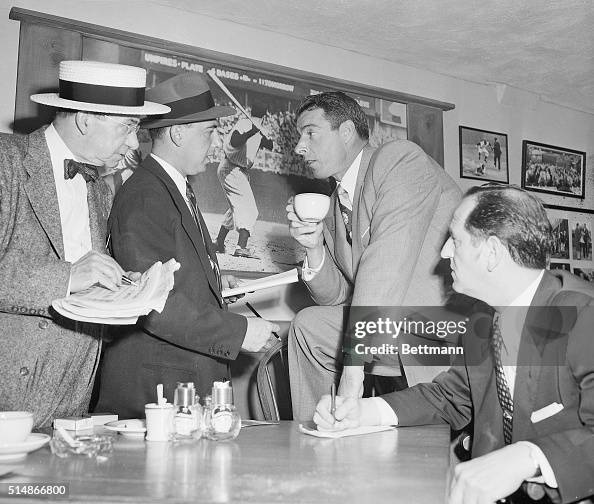Joe Dimaggio retired Yankee slugger taks to newsmen in the Press Joe Dimaggio retired Yankee slugger taks to newsmen in the Press