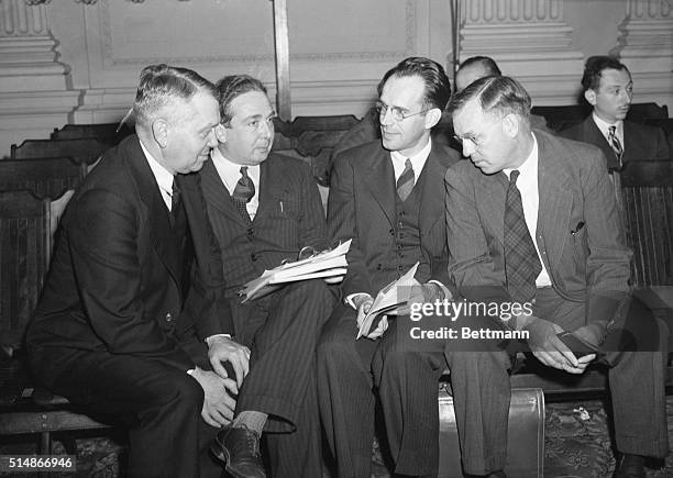 Harold C. Urey, Leo Szilard, Lyle B. Borst, and an unidentified fourth scientist talk at Capitol Hill. They are in the capital to speak to members of...